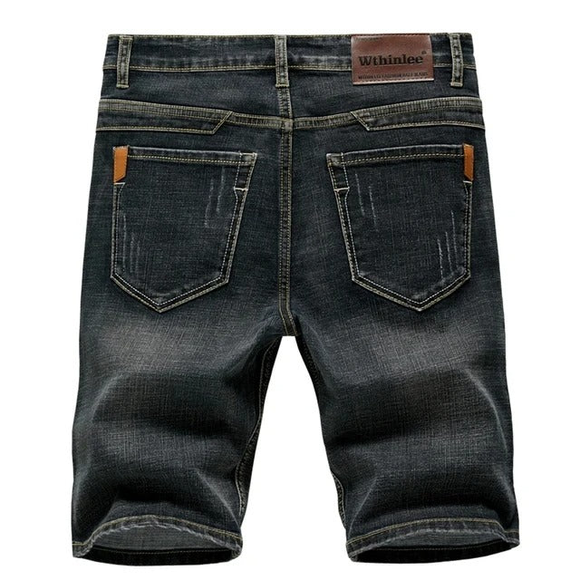 Black men's classic relaxed fit shorts. Comfortable five-pocket casual shorts for everyday and summer fashion.