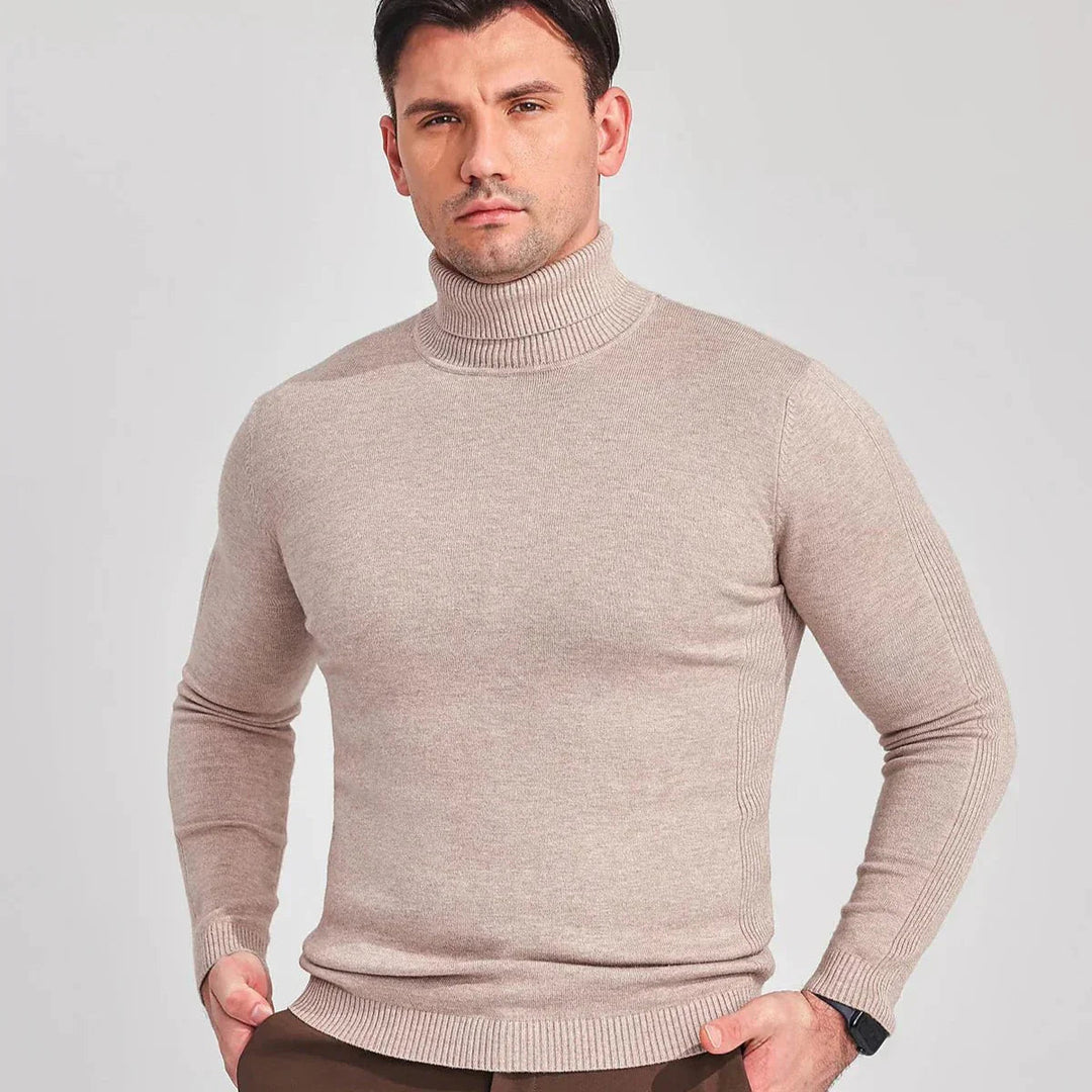 Men's stylish roll neck jumper in navy, providing a comfortable fit and elegant look for winter fashion.