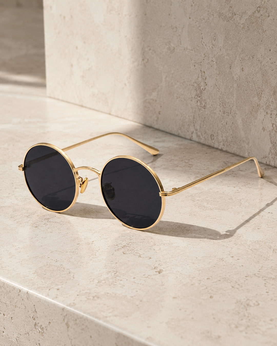 Men's classic round metal frame sunglasses with tinted lenses for retro style eyewear.