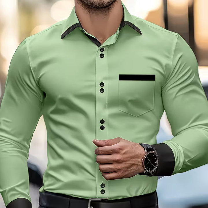 Close-up of men's classic slim fit collared button-down shirt. Details show quality buttons, versatile for any look.