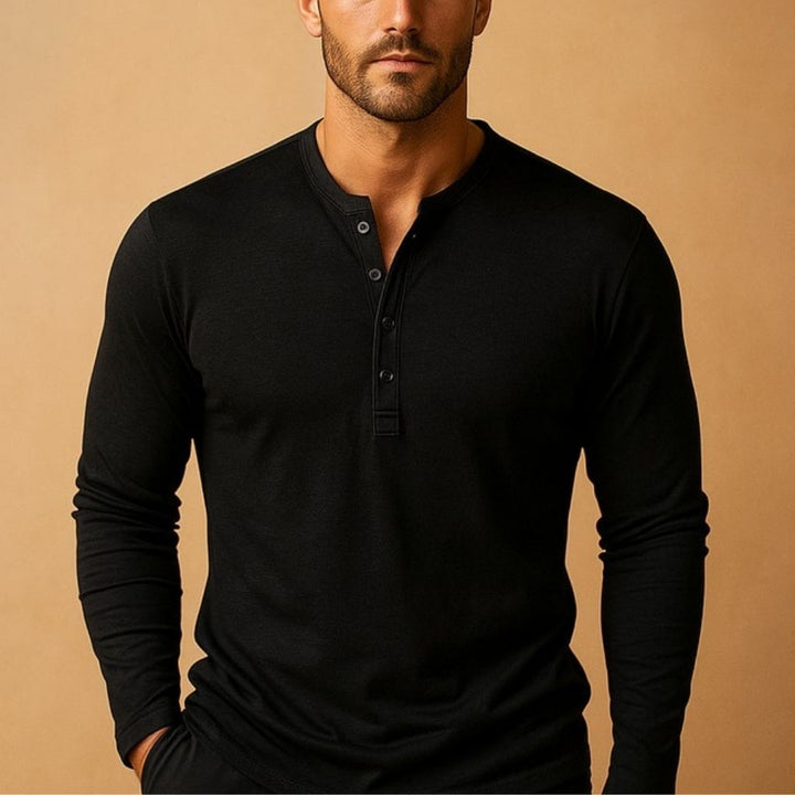 Long sleeve slim fit men's Henley shirt, featuring a stylish button neck, comfortable for any casual occasion.