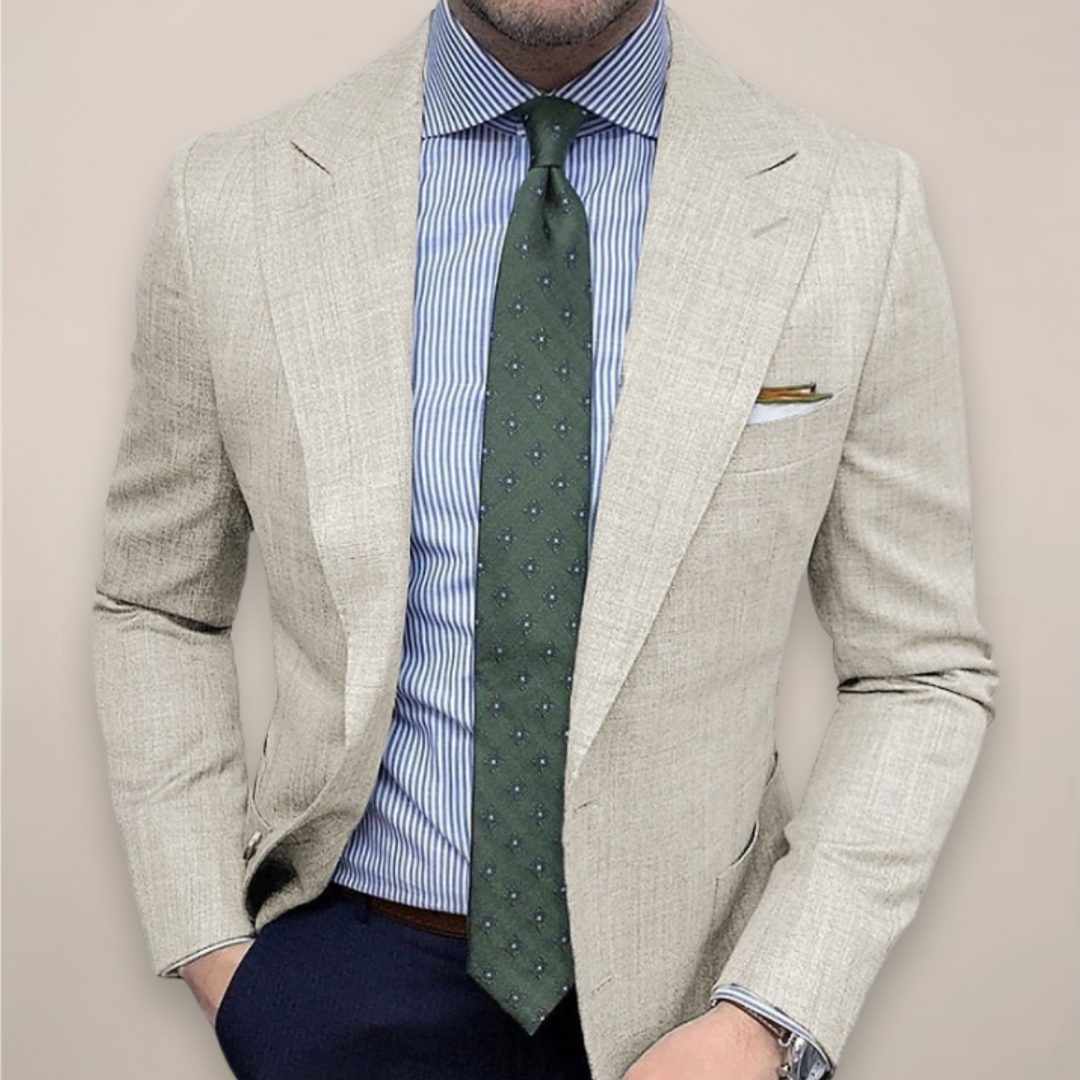 Blue men's textured slim-fit blazer, a classic jacket for a refined look. Ideal for business casual and fashion-forward menswear.