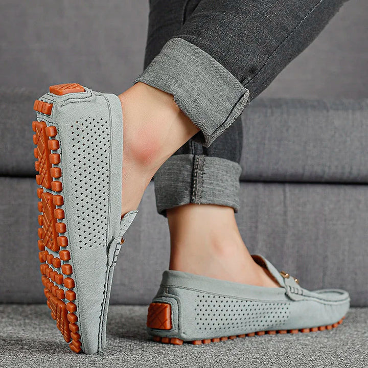 Classic men's loafers, easy slip-on style, offering breathable comfort & versatility.