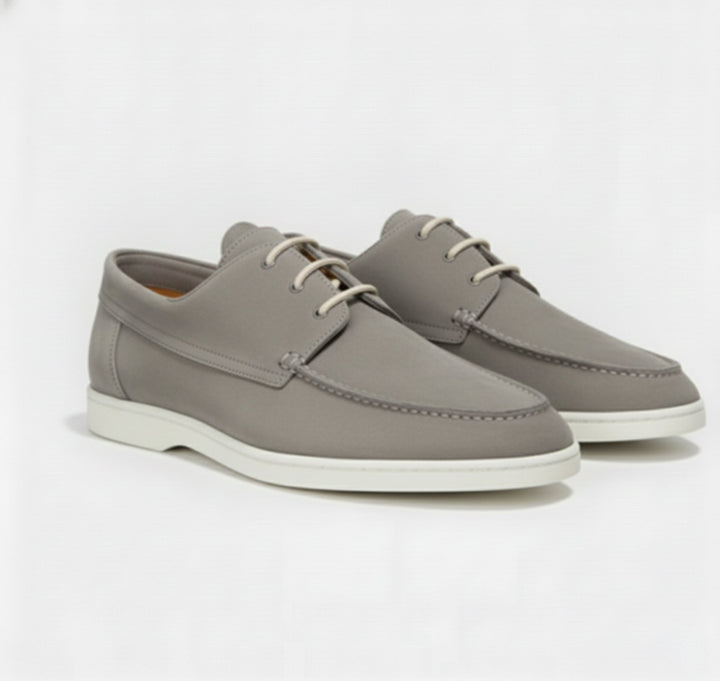 Elegant brown leather men's slip-on loafers, offering timeless style & exceptional comfort for smart casual outfits.