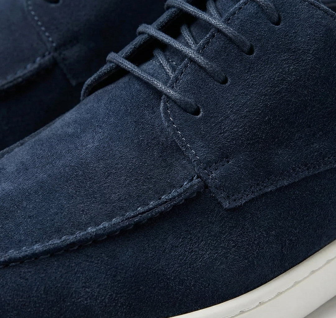 Side profile of men's classic slip-on loafers, highlighting timeless design & comfortable fit for daily use.
