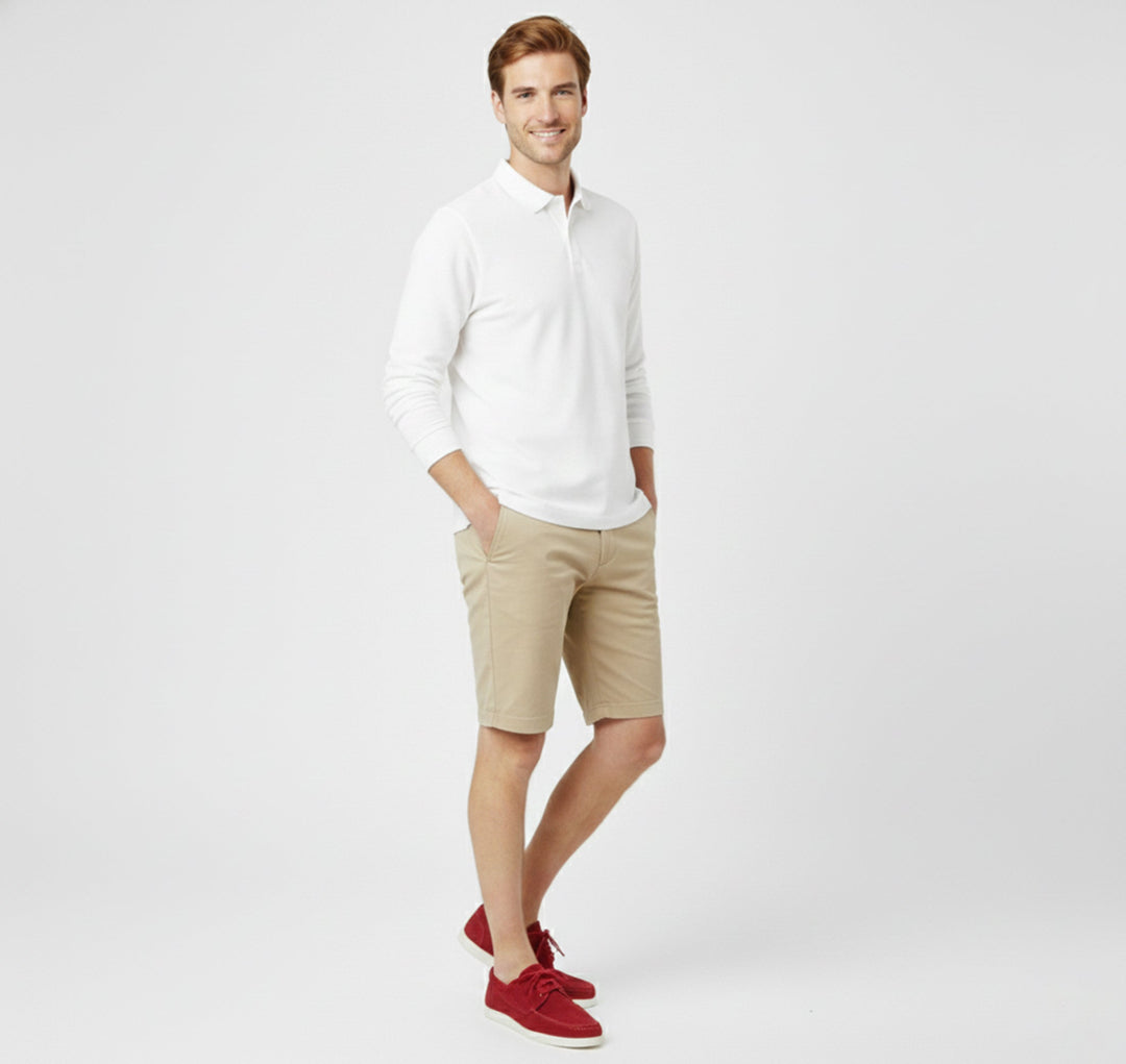 Men's classic slip-on loafers stylishly paired with dark wash jeans, a comfortable & trendy casual footwear choice.