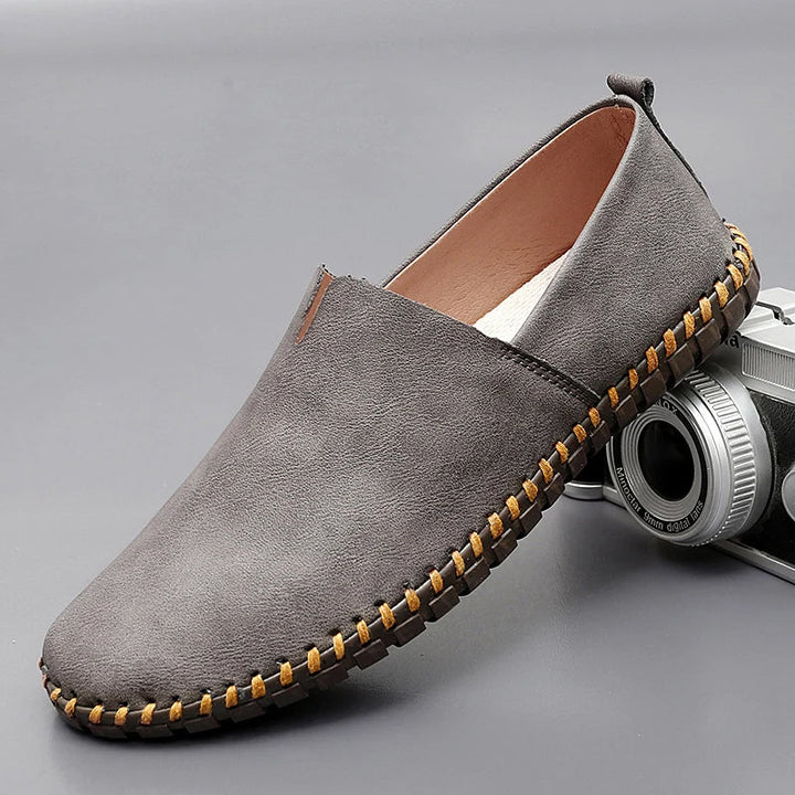 Classic men's loafers with a timeless design, offering comfort and versatile style for smart casual outfits.