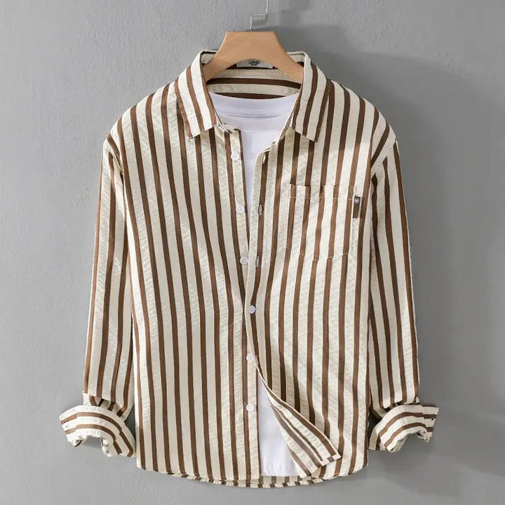 Crisp men's striped long-sleeve button-down shirt, showcasing its versatile smart-casual design and classic appeal.