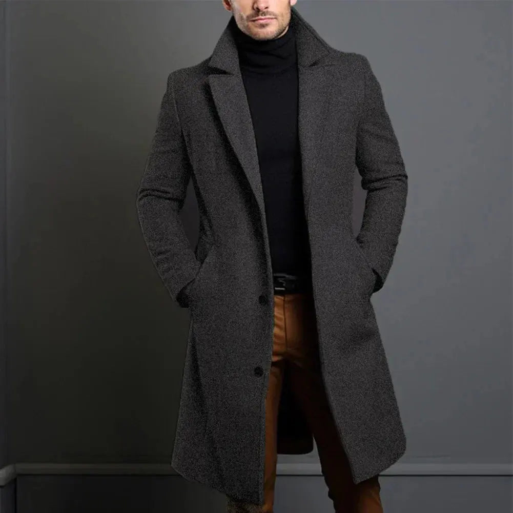 Front view of a men's classic tailored long overcoat. Essential smart casual trench coat for winter fashion.