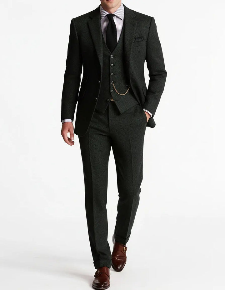 Elegant men's tailored three-piece suit, ideal for formal wear, weddings, and special events. Includes jacket, vest, trousers.