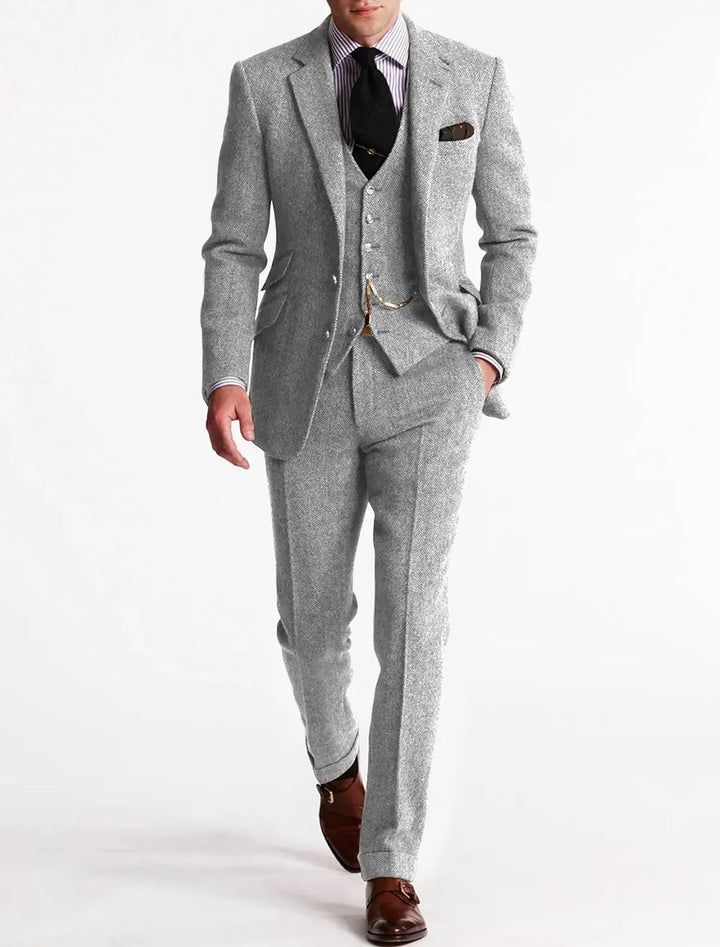 Gentleman's classic tailored three-piece suit for men. Perfect elegant formal wear for weddings & special events.