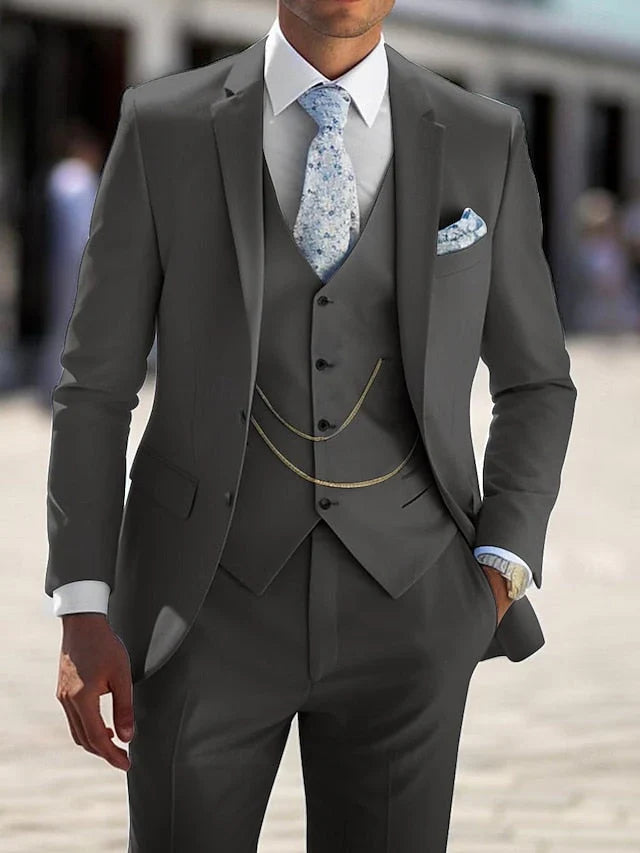 Tailored men's three-piece suit for a sharp look. Ideal for wedding suits, prom, business meetings, and formal occasions.