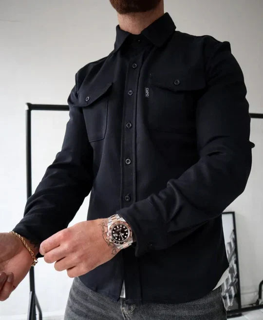 Stylish men's long-sleeve utility shirt. Durable fabric, classic button-up design with chest pockets for versatile wear.
