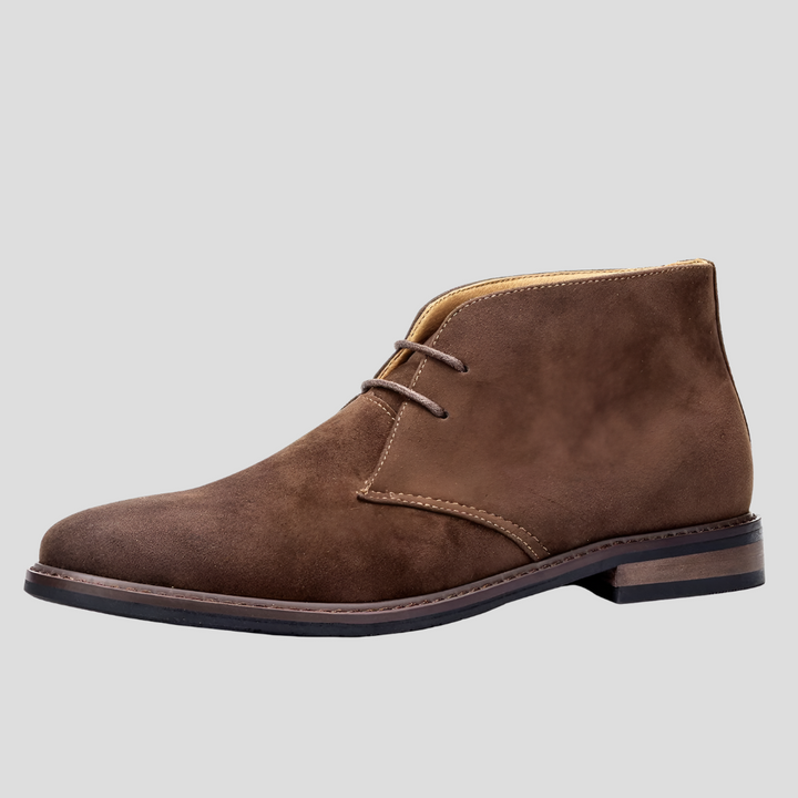 Men's vintage desert boots with a classic lace-up design. Essential casual footwear for timeless style & comfort.