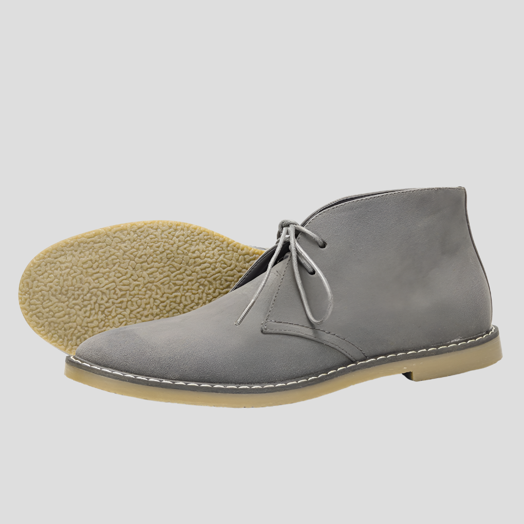 Timeless men's desert boots. Classic vintage footwear, lace-up style, offering comfort for versatile casual fashion.