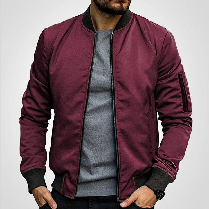 Classic men's bomber jacket featuring ribbed collar & cuffs. Versatile zip-up flight jacket for spring & fall fashion.