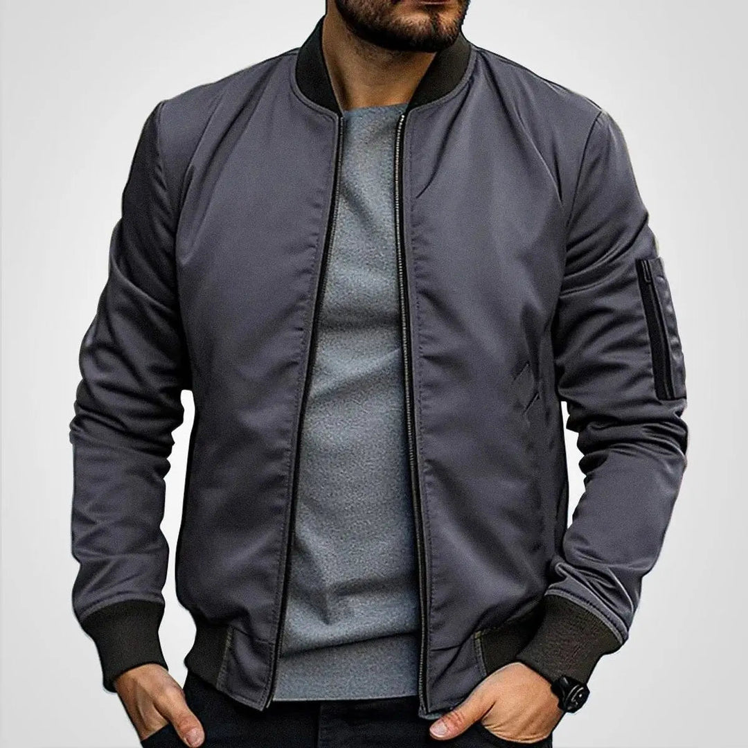 Classic men's bomber, a stylish zip-up flight jacket. Essential outerwear with ribbed details for casual wear.