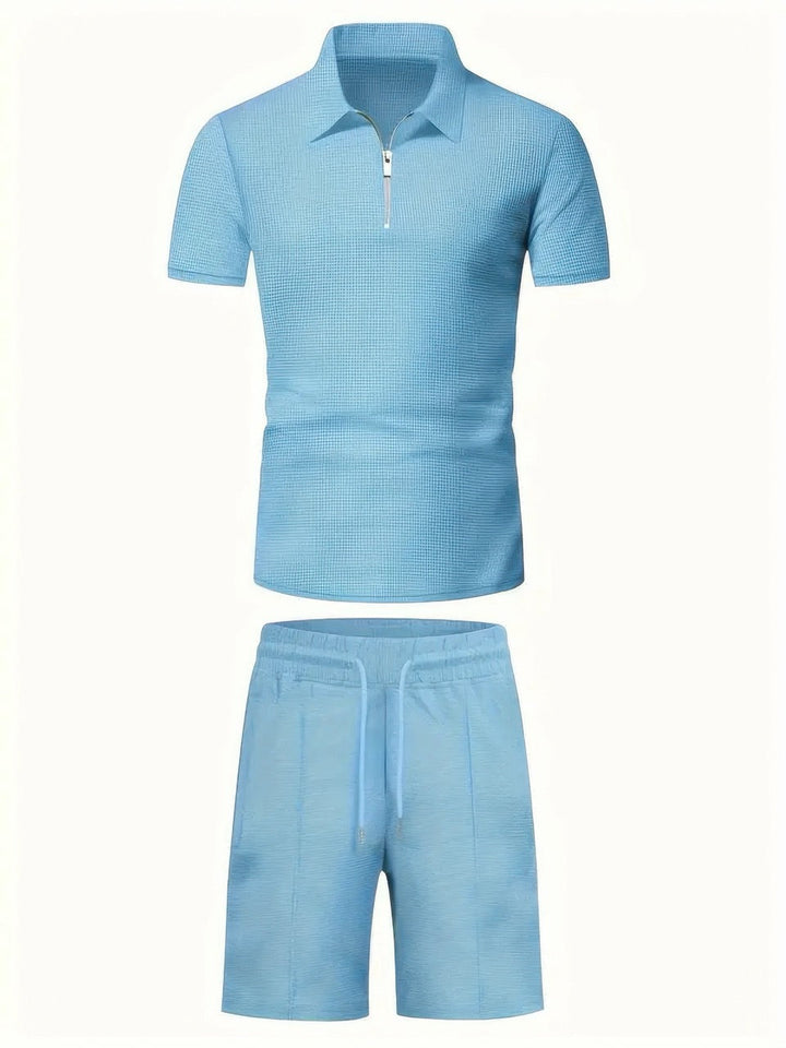 Comfortable men's vacation outfit: classic zipper shirt and shorts set for ultimate relaxation and style.