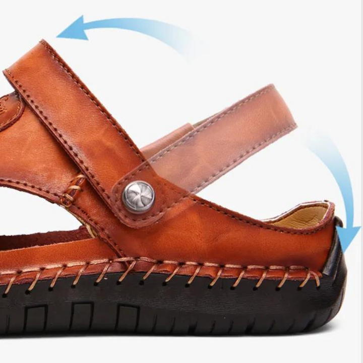 Man wearing breathable closed-toe comfort sandals, walking outdoors. Ideal men's summer travel shoes.