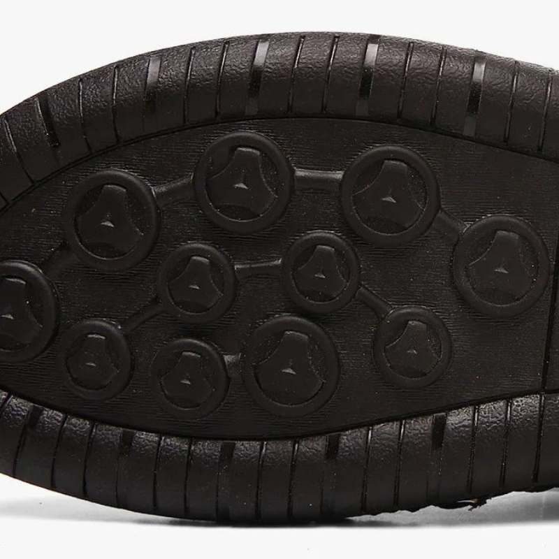 Detail of breathable upper on men's closed-toe comfort sandals. Secure & comfy for all-day summer wear.