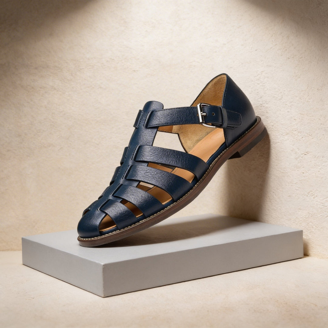Men's closed-toe fisherman sandals with intricate woven leather straps, ideal for summer casual wear.