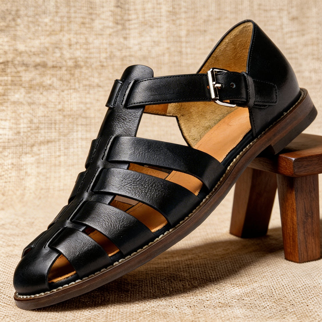 Stylish men's closed-toe fisherman sandals with hand-woven leather straps for a classic summer look.