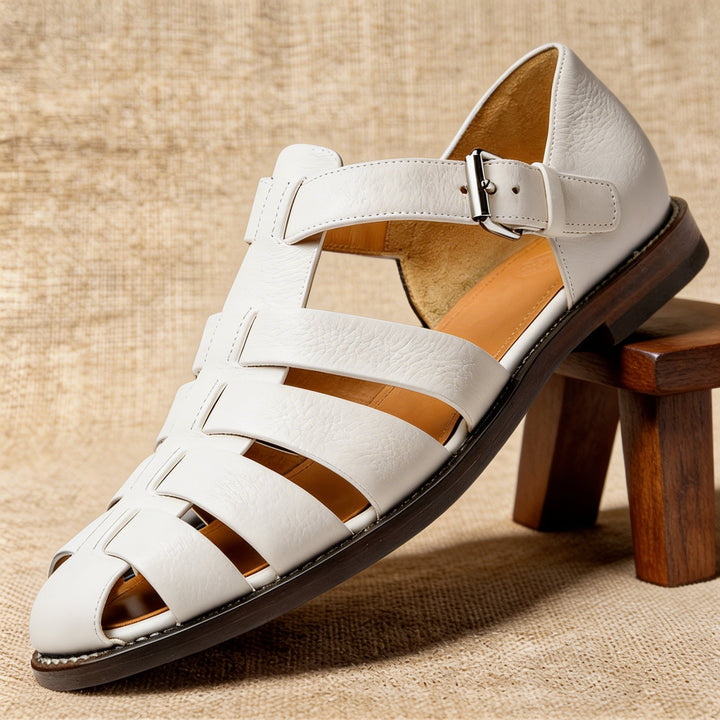 Detailed men's closed-toe fisherman sandals showcasing secure, intricate woven straps and robust sole.