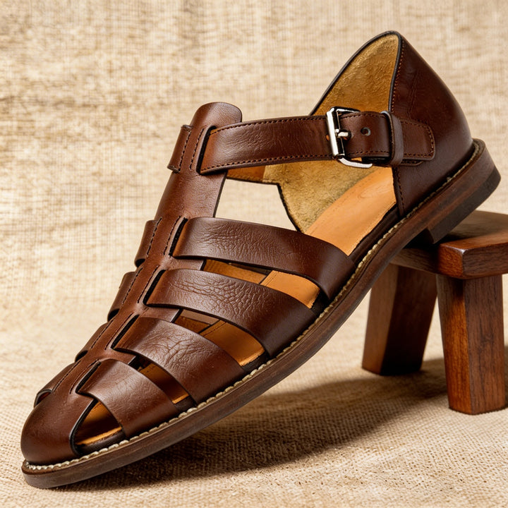 Pair of men's closed-toe fisherman sandals, side view, highlighting the woven straps and secure fit for summer.