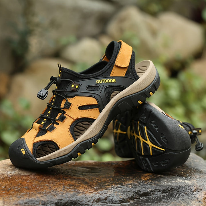 Durable men's closed toe outdoor footwear for rugged hiking. Adventure shoes with adjustable comfort.
