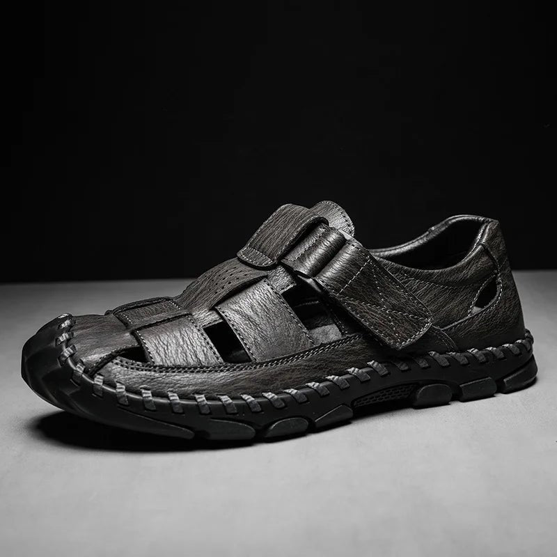 Side view of men's closed-toe brown leather fisherman sandals with hook-loop closure for comfort & outdoor walking.