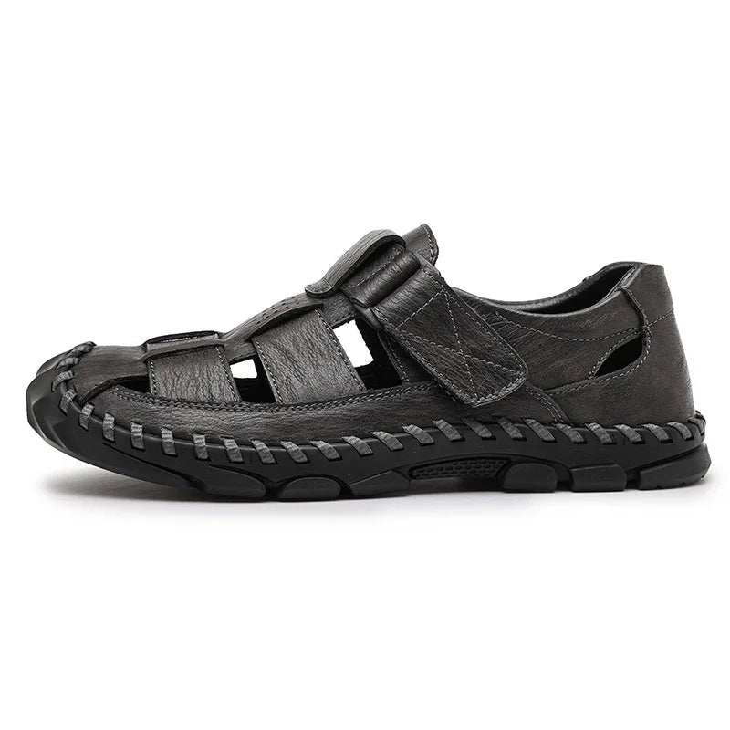 Top view of black men's closed-toe leather fisherman sandals, hook-loop design. Ideal for summer casual wear.