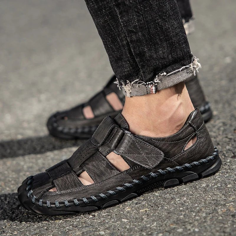 Men's outdoor leather fisherman sandals, closed-toe for protection. Hook-loop ensures comfort on walks.