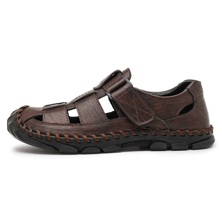 Brown men's leather fisherman sandals, closed-toe, hook-loop. Ideal for casual summer walking & outdoor comfort.
