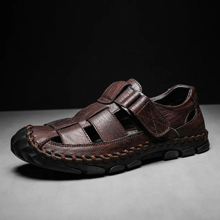 Black men's durable leather fisherman sandals with closed toe, hook-loop. Great for all-terrain outdoor adventures.
