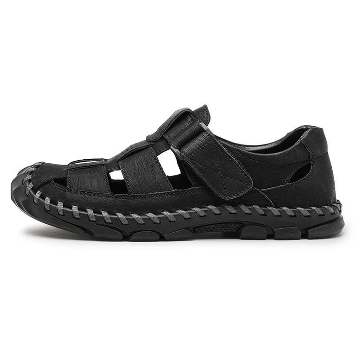 Durable men's all-terrain leather fisherman sandals, closed-toe, hook-loop. Ideal for outdoor adventures.