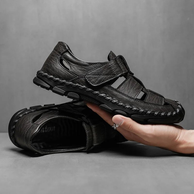 Men's closed-toe leather fisherman sandals with adjustable hook-loop closure. Comfortable for walking & outdoor use.