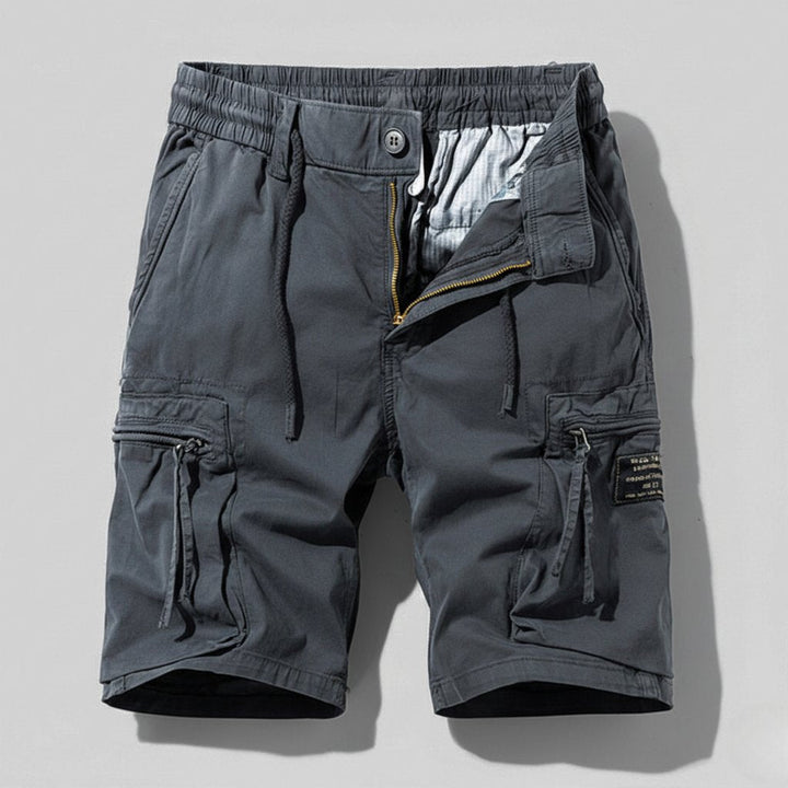 Durable men's work cargo shorts, combat style with multi-pockets and elastic waist, ideal for tough tasks.