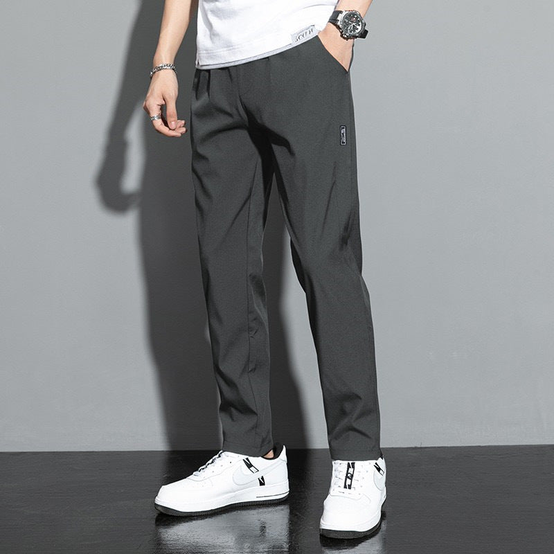 Versatile men's straight leg pants with elastic waist & stretch fabric for comfort and everyday wear.