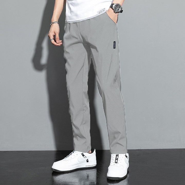Stylish men's straight leg casual pants with slash pockets, offering comfort for office & daily fashion.