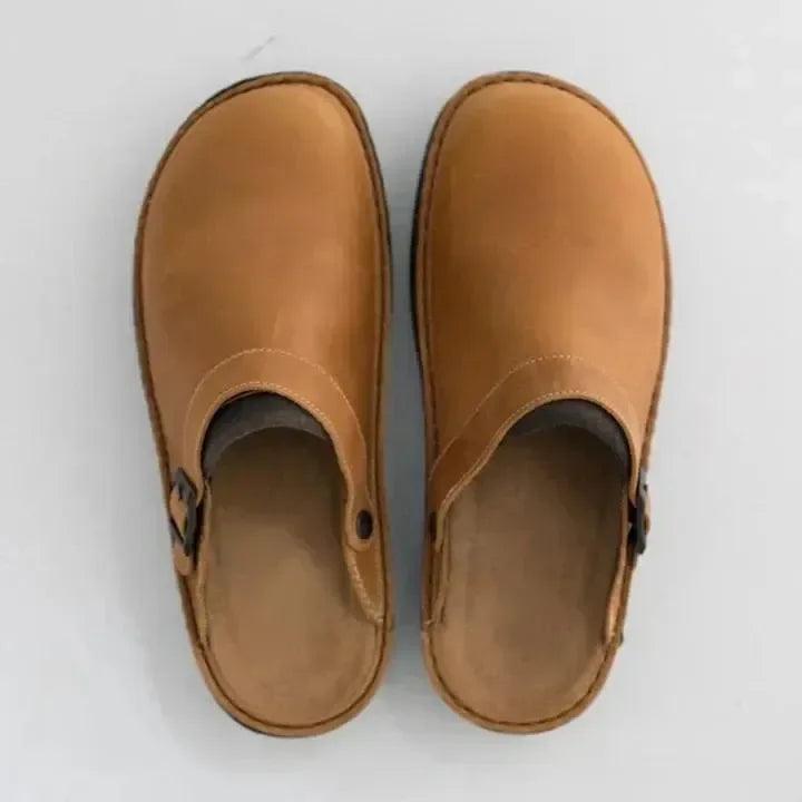 Men's comfort footwear: supportive, slip-on slippers designed for breathability and daily indoor/outdoor use.