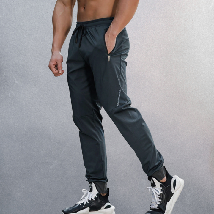 Men's comfortable active sports pants, elastic waist, ideal for workouts, travel, and casual everyday wear.