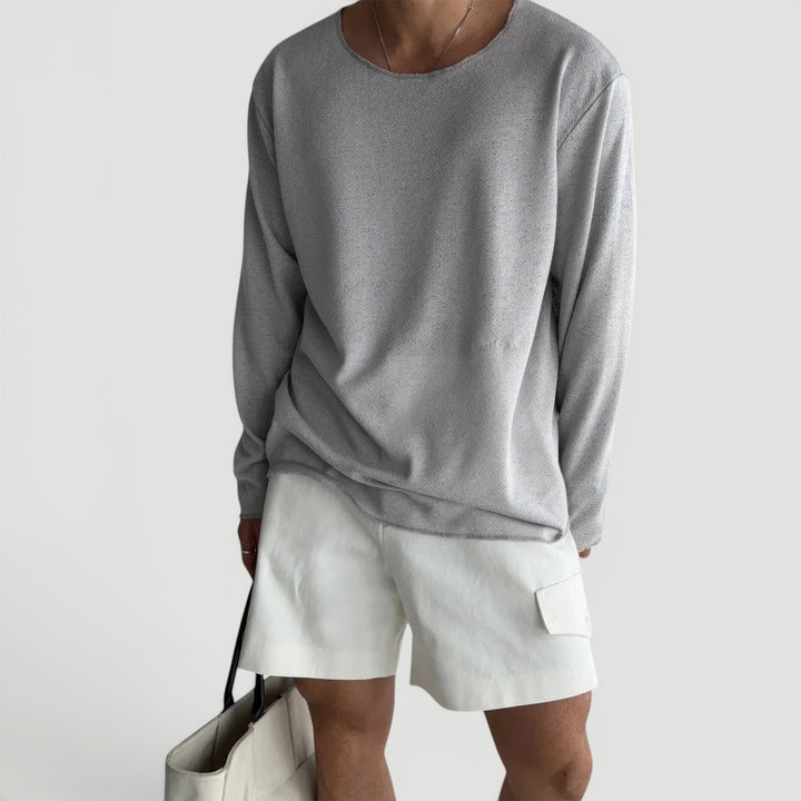 Soft feel men's knit pullover shirt. Relaxed fit for comfortable all-season casual wear.