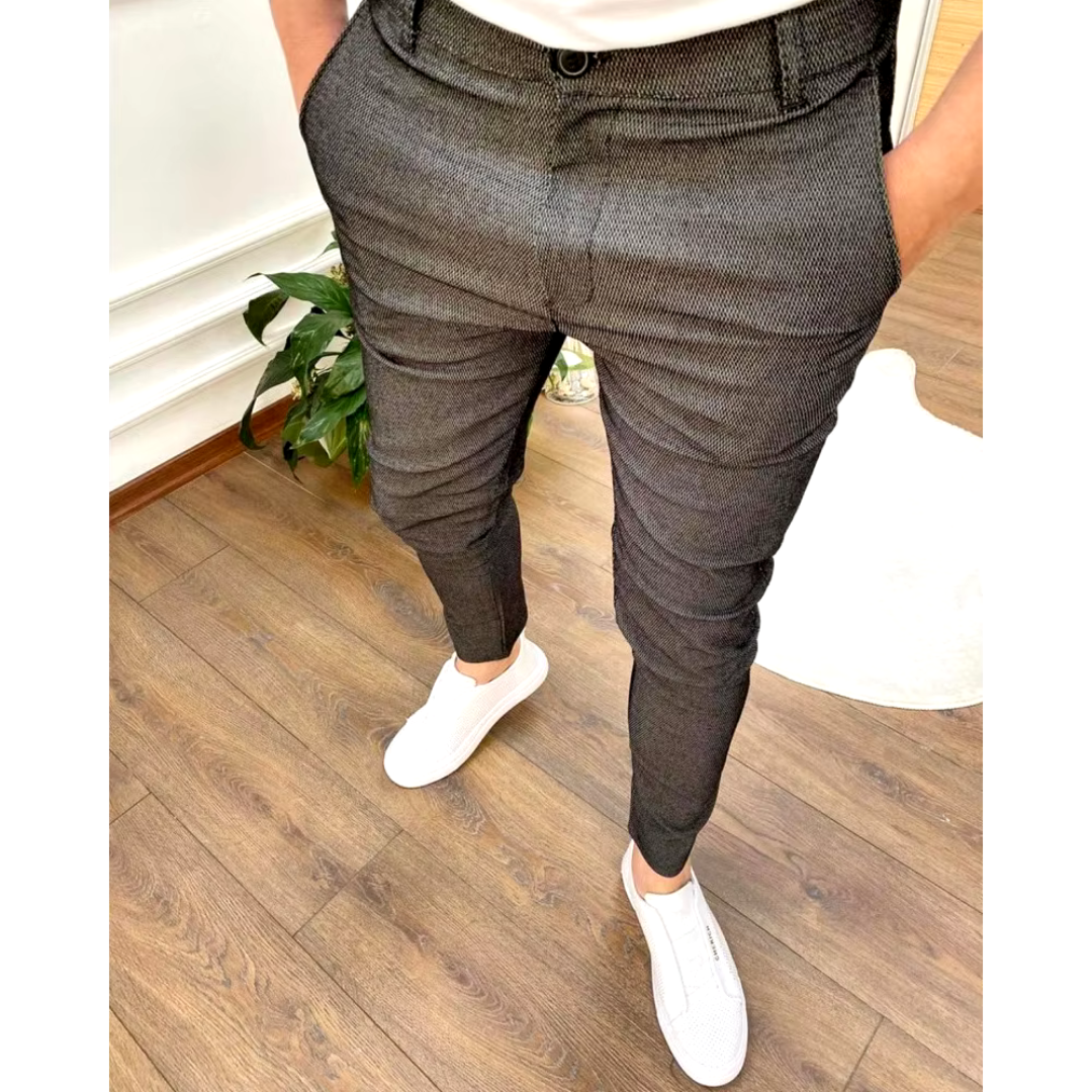 Stylish navy men's chino trousers, ideal for versatile smart-casual outfits. Comfortable & modern everyday wear.