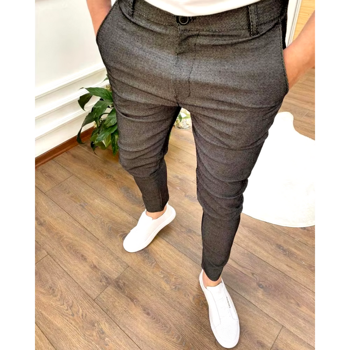 Stylish navy men's chino trousers, ideal for versatile smart-casual outfits. Comfortable & modern everyday wear.