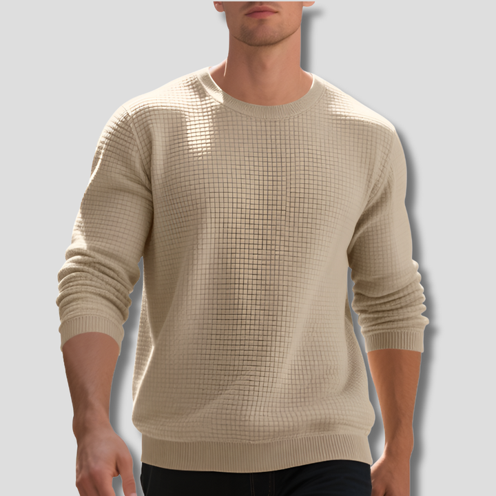 Men's comfortable beige waffle knit sweater, long sleeve pullover for casual fall & winter layering. Everyday knitwear style.