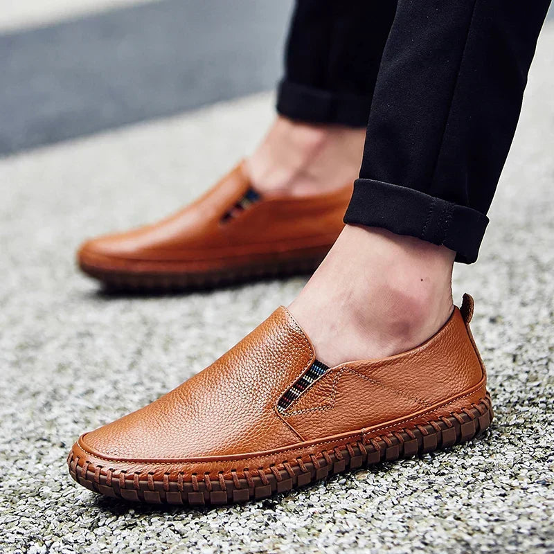 Men's comfortable black slip-on walking shoes with flexible sole, ideal for daily casual wear.