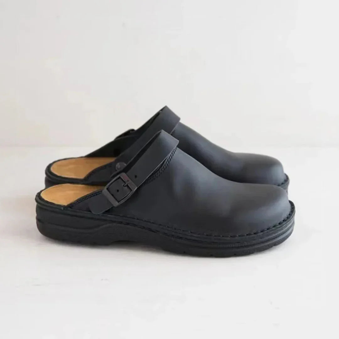 Slip-on men's clogs with adjustable buckle strap for ultimate comfort. Ideal casual footwear for home & everyday use.