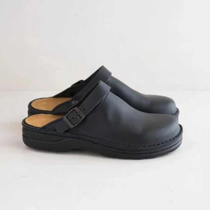 Slip-on men's clogs with adjustable buckle strap for ultimate comfort. Ideal casual footwear for home & everyday use.