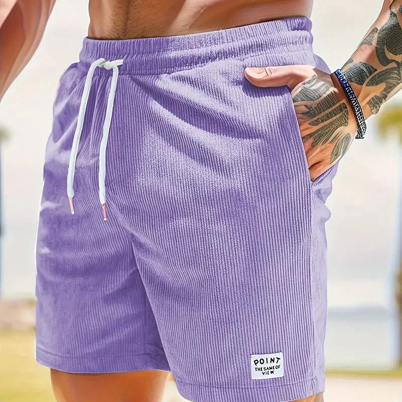 Close-up of the comfortable drawstring waistband on men's casual shorts.