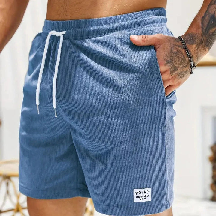 Man modeling comfortable drawstring casual shorts for a relaxed everyday look.